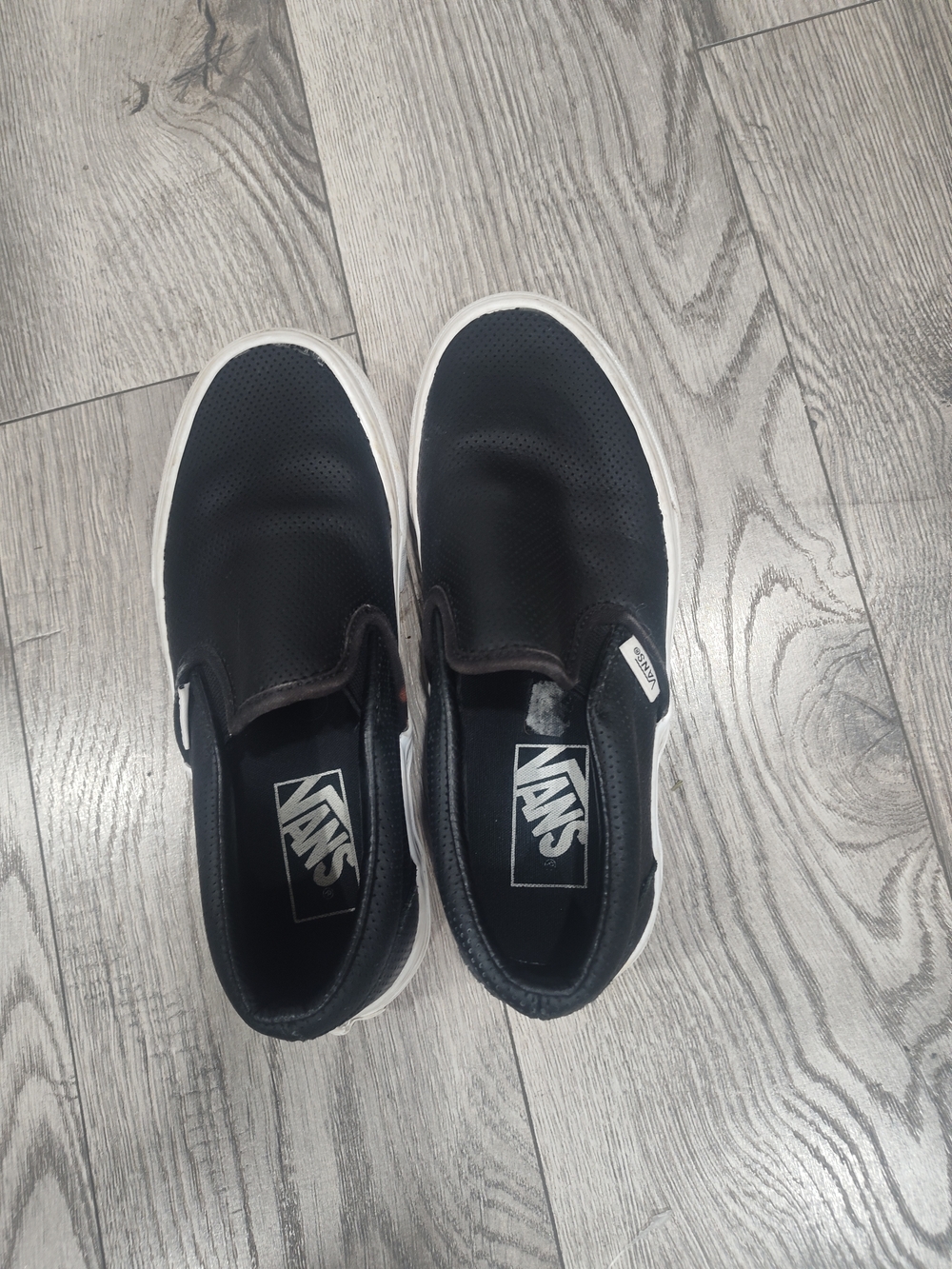 Vans Black Slip-On Perforated Skate Shoes with White Sole